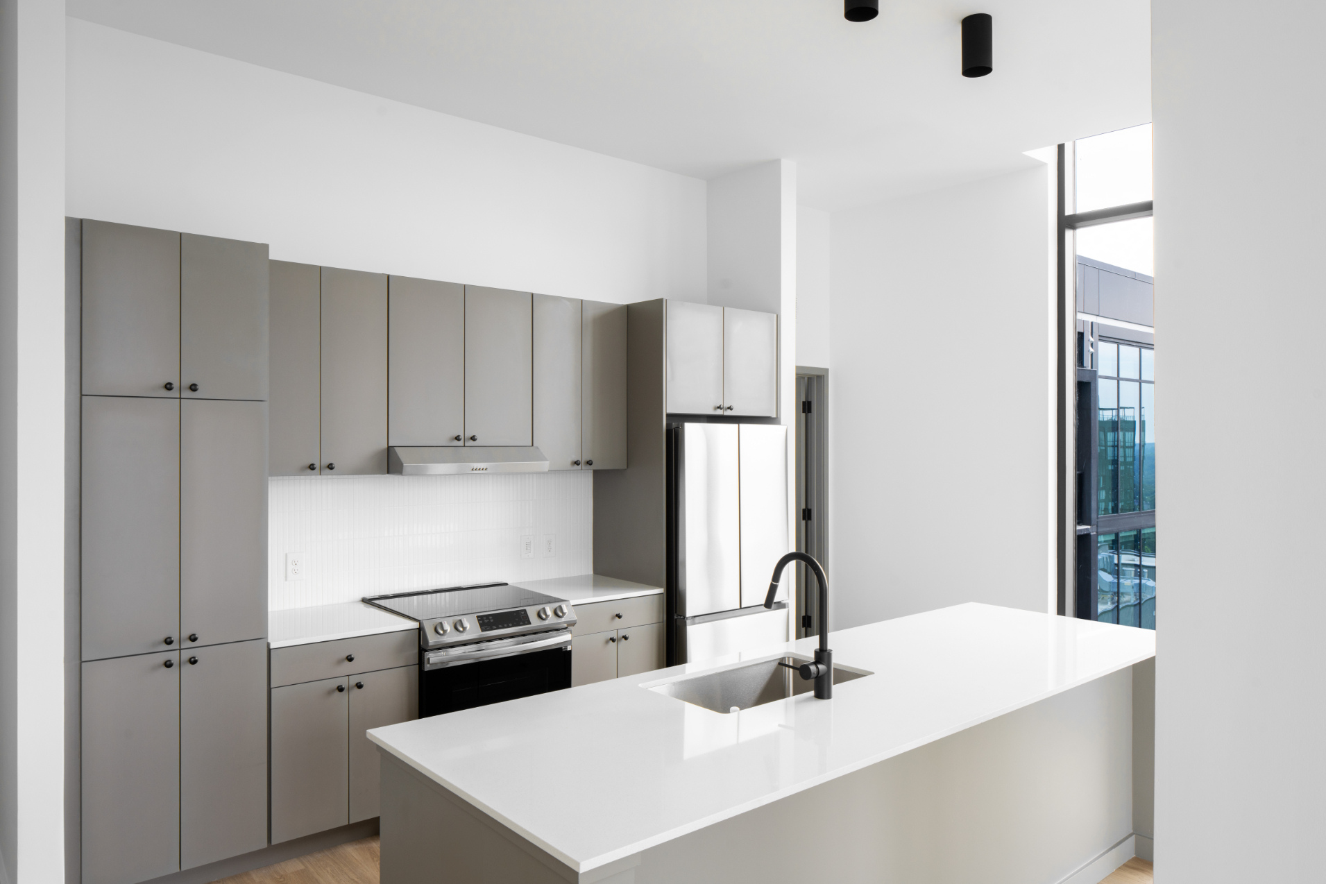 Kitchen in an Emmi Midtown's luxury penthouse apartment in Atlanta, GA